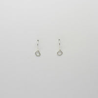 Tiny silver hook earrings by Bea Jareno
