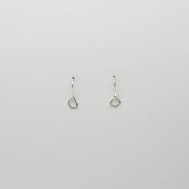 Tiny silver hook earrings by Bea Jareno