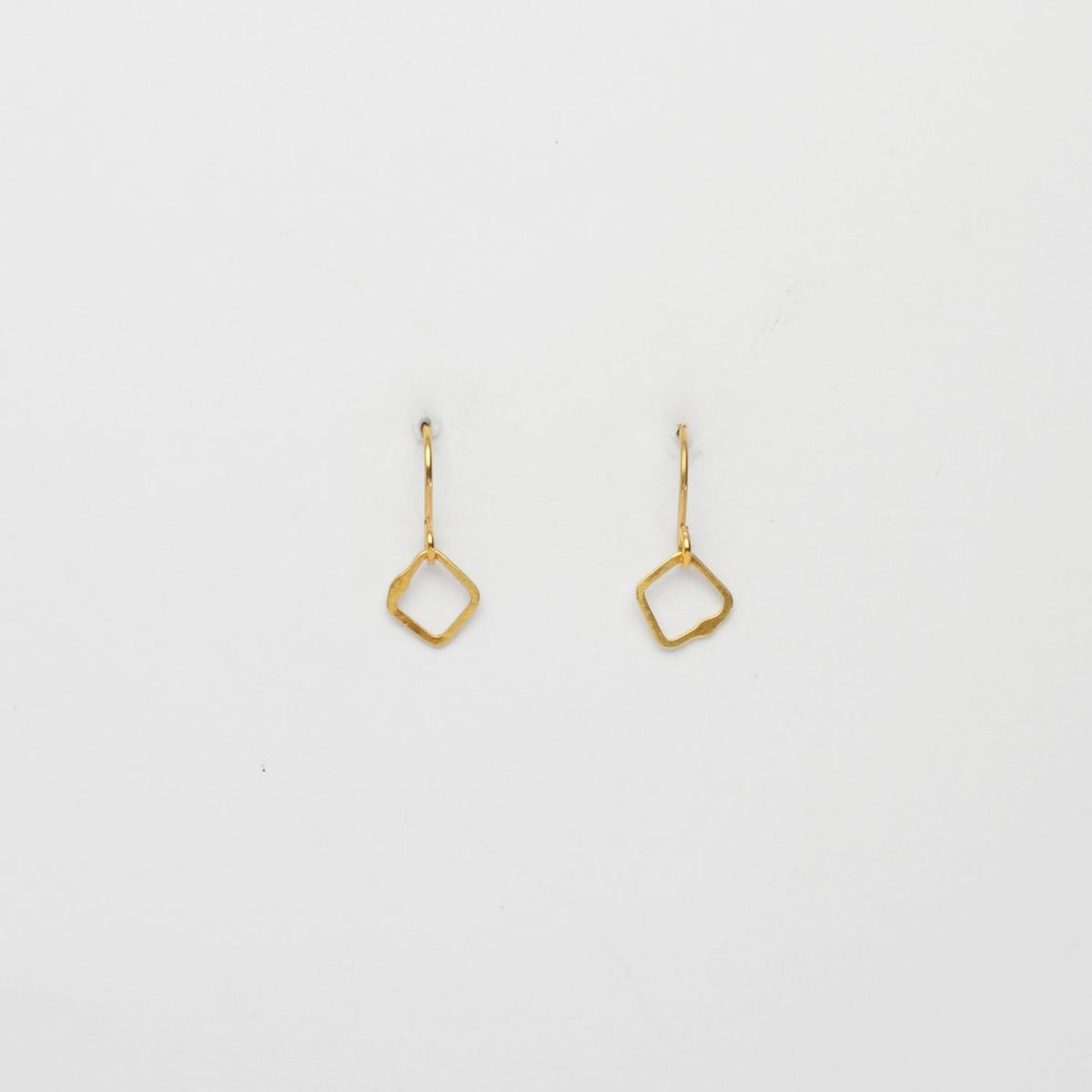Silver 24kt hook earrings by Bea Jareno