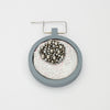 Brooch - Beading on cotton with stem stitch & seeding by Beatrice Mayfield
