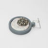 Brooch - Beading on cotton with stem stitch & seeding by Beatrice Mayfield