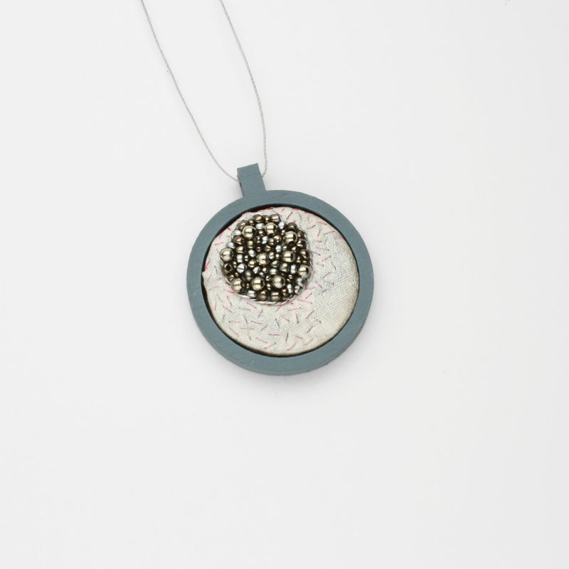 Necklace - small beading on cotton with stem stitch by Beatrice Mayfield