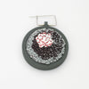 Brooch - Sequins & French knots on cotton by Beatrice Mayfield