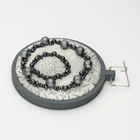 Brooch - Beading on cotton with seeding by Beatrice Mayfield
