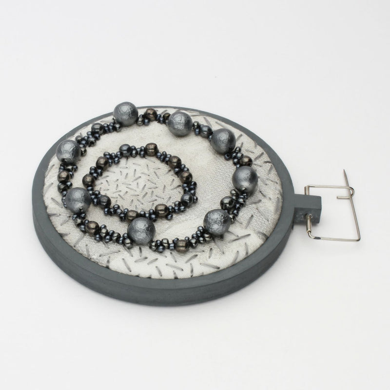 Brooch - Beading on cotton with seeding by Beatrice Mayfield