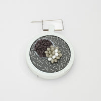 Brooch - Beading on cotton with French knots by Beatrice Mayfield