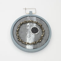 Brooch - Beading on cotton with stem stitch & French knots by Beatrice Mayfield