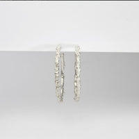 Large silver coral hoops by Blae Maddrell