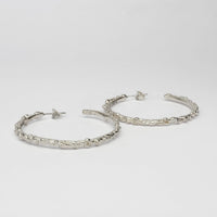Large silver coral hoops by Blae Maddrell