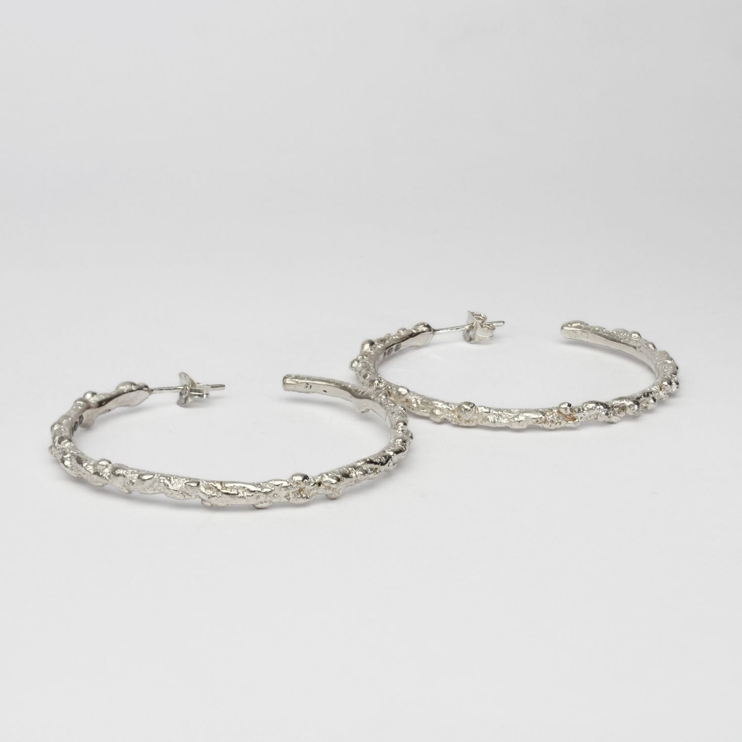 Large silver coral hoops by Blae Maddrell