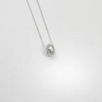 Textured round silver pendant by Blae Maddrell