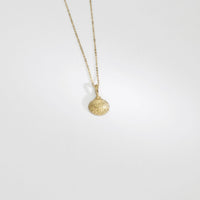 9ct gold mini cockle shell pendant by Blae Maddrell