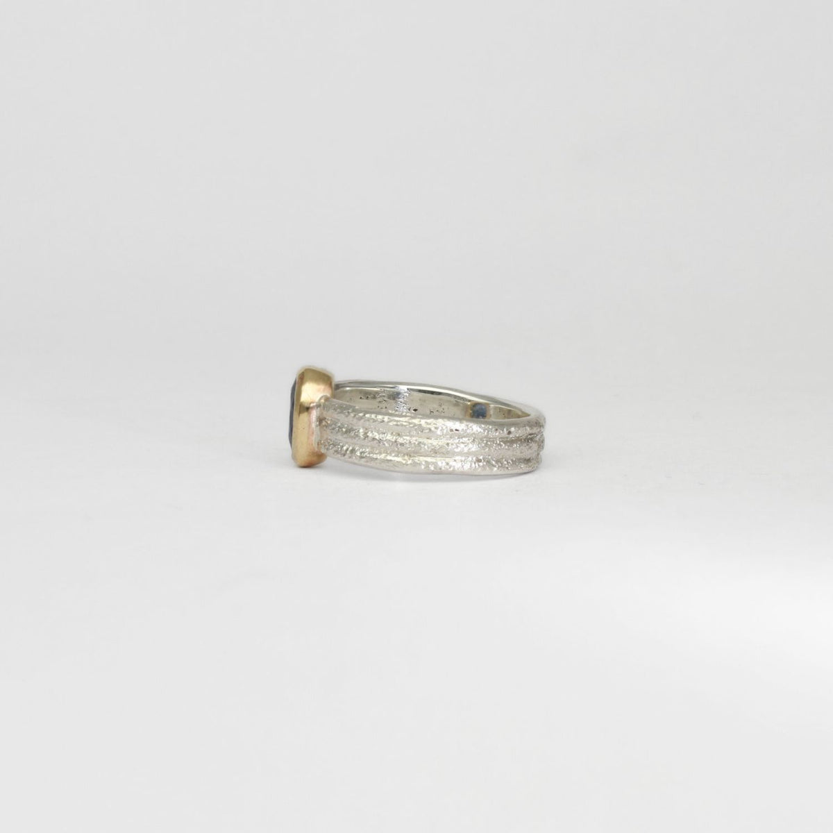 Sandbar silver & 9ct gold ring with kanchanaburi sapphire by Blae Maddrell