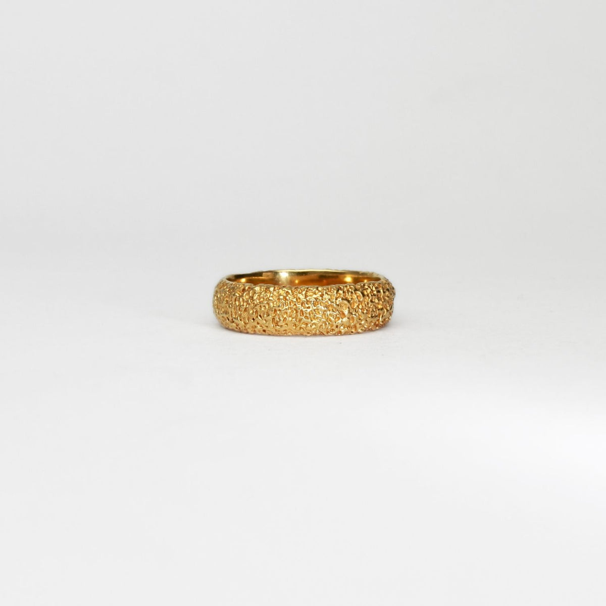 Wide sand band silver 18ct gold plated ring by Blae Maddrell