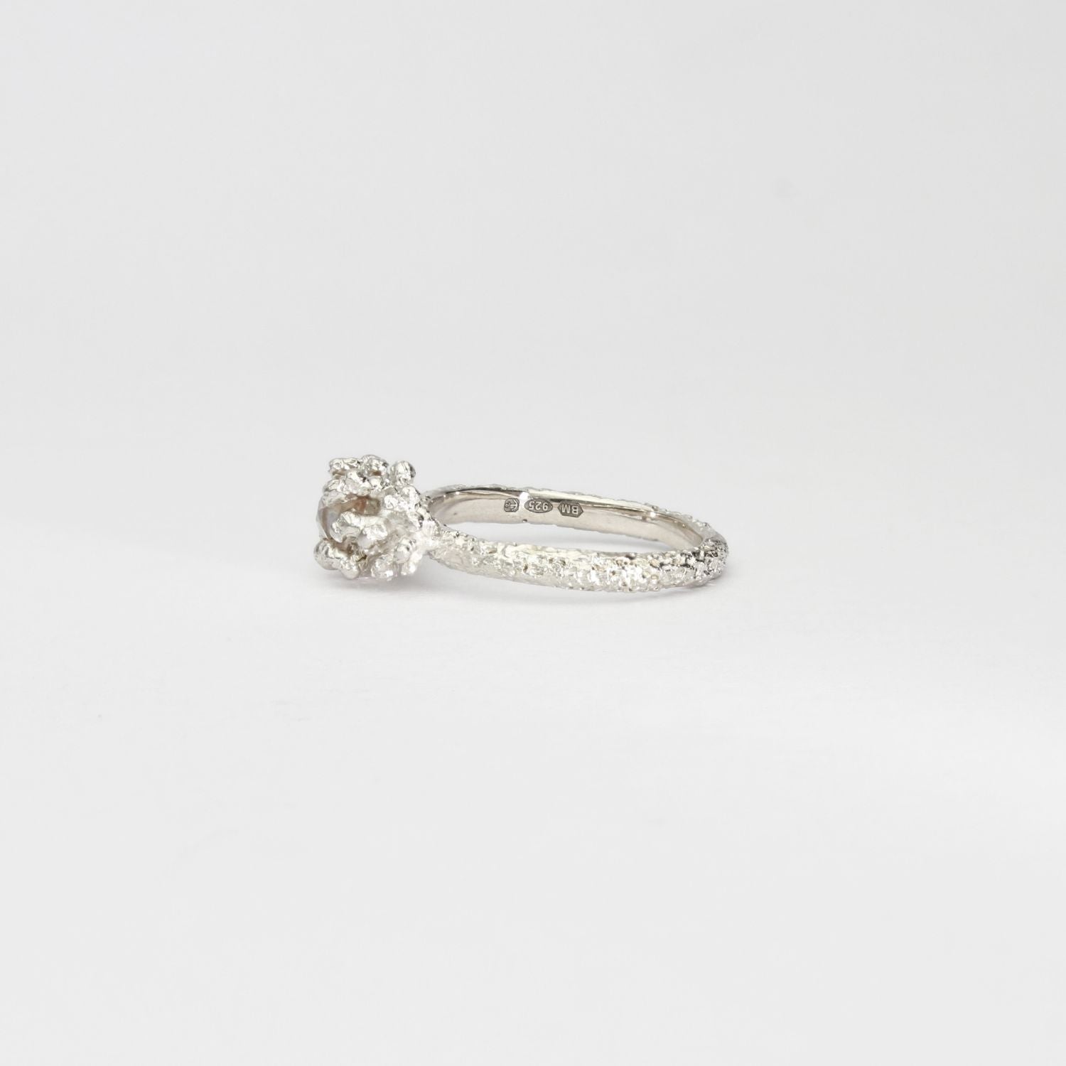 Coral cluster silver ring with pale pink zircon by Blae Maddrell