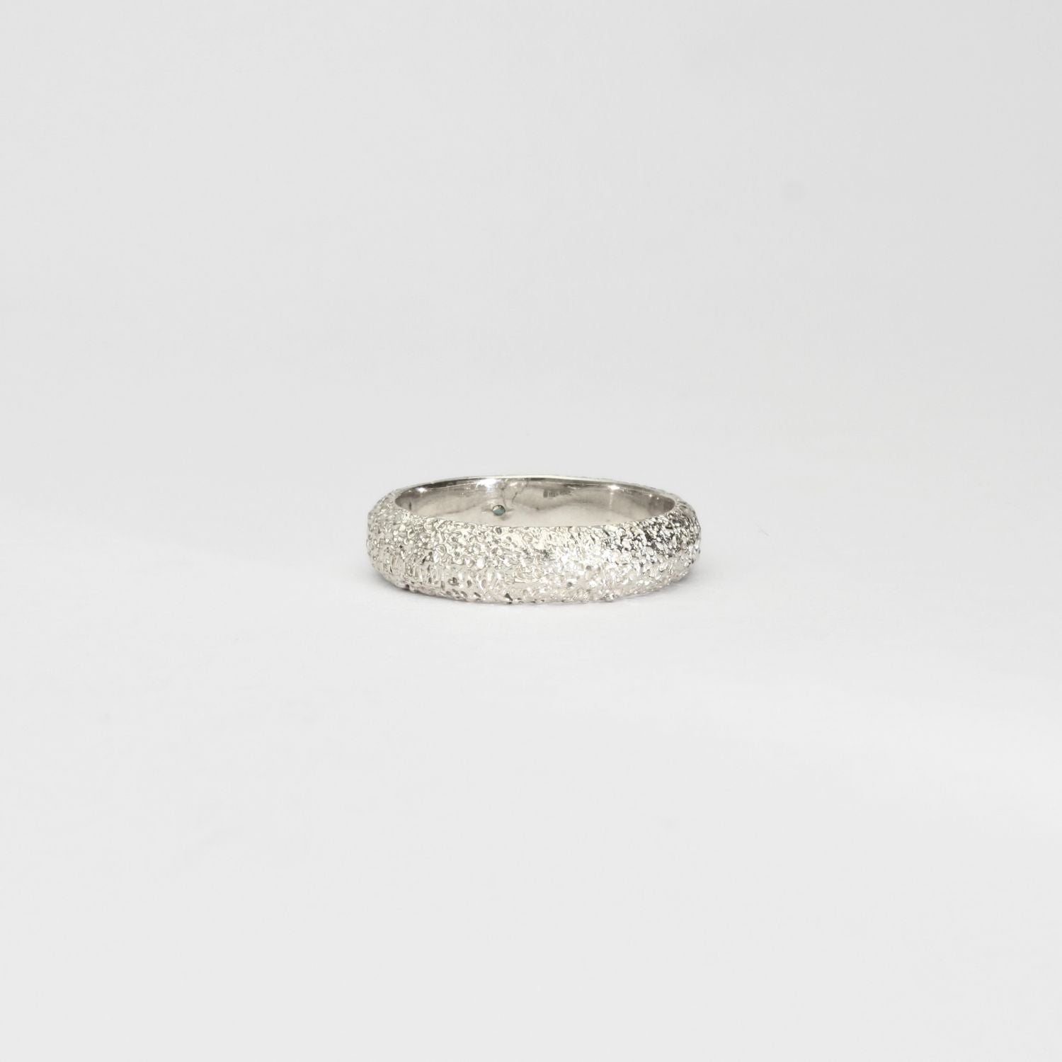 Silver sand band with Australian sapphire by Blae Maddrell