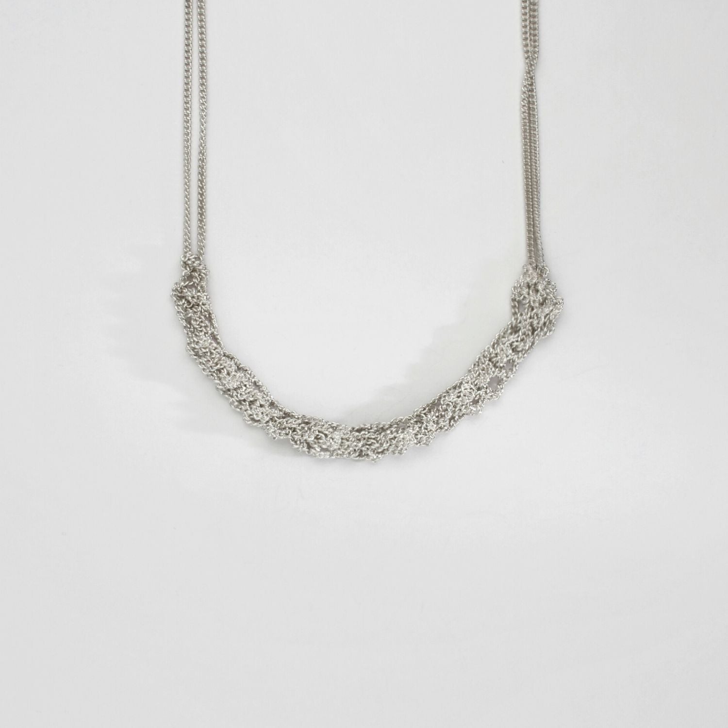Crochet in front double row silver necklace by Sabine Roth