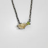 Rutile quartz & zircon black silver pendant by Chris Boland