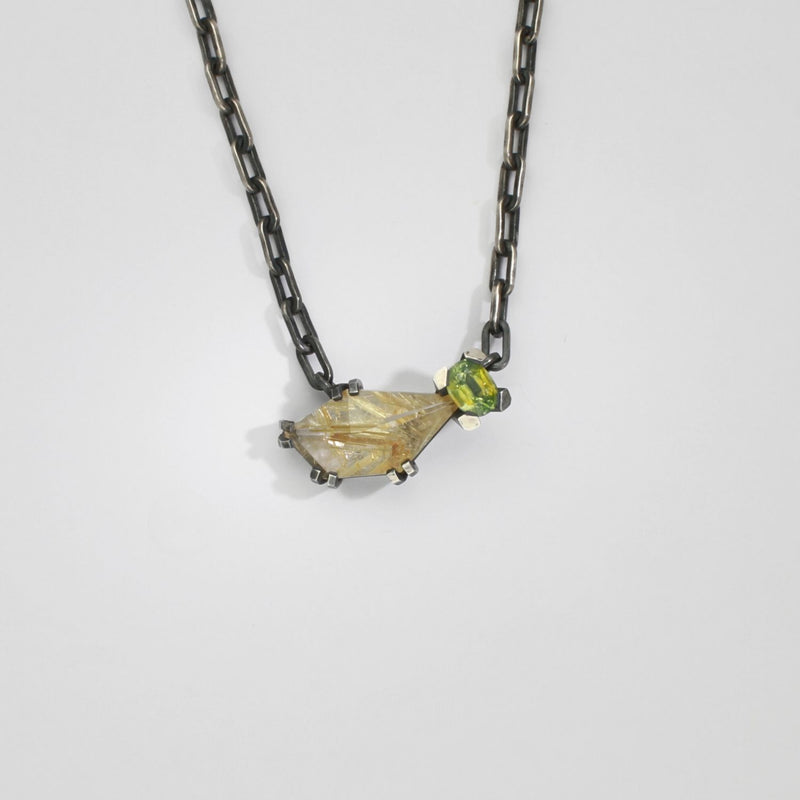 Rutile quartz & zircon black silver pendant by Chris Boland
