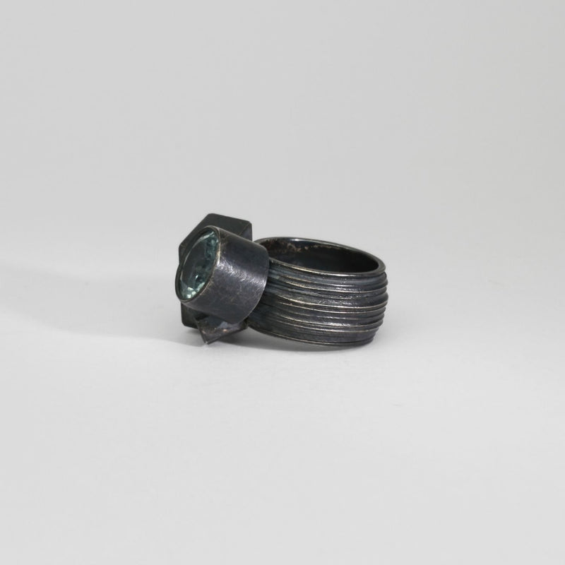 Round aquamarine black silver ring by Chris Boland