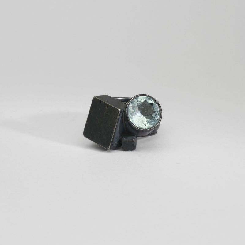 Round aquamarine black silver ring by Chris Boland