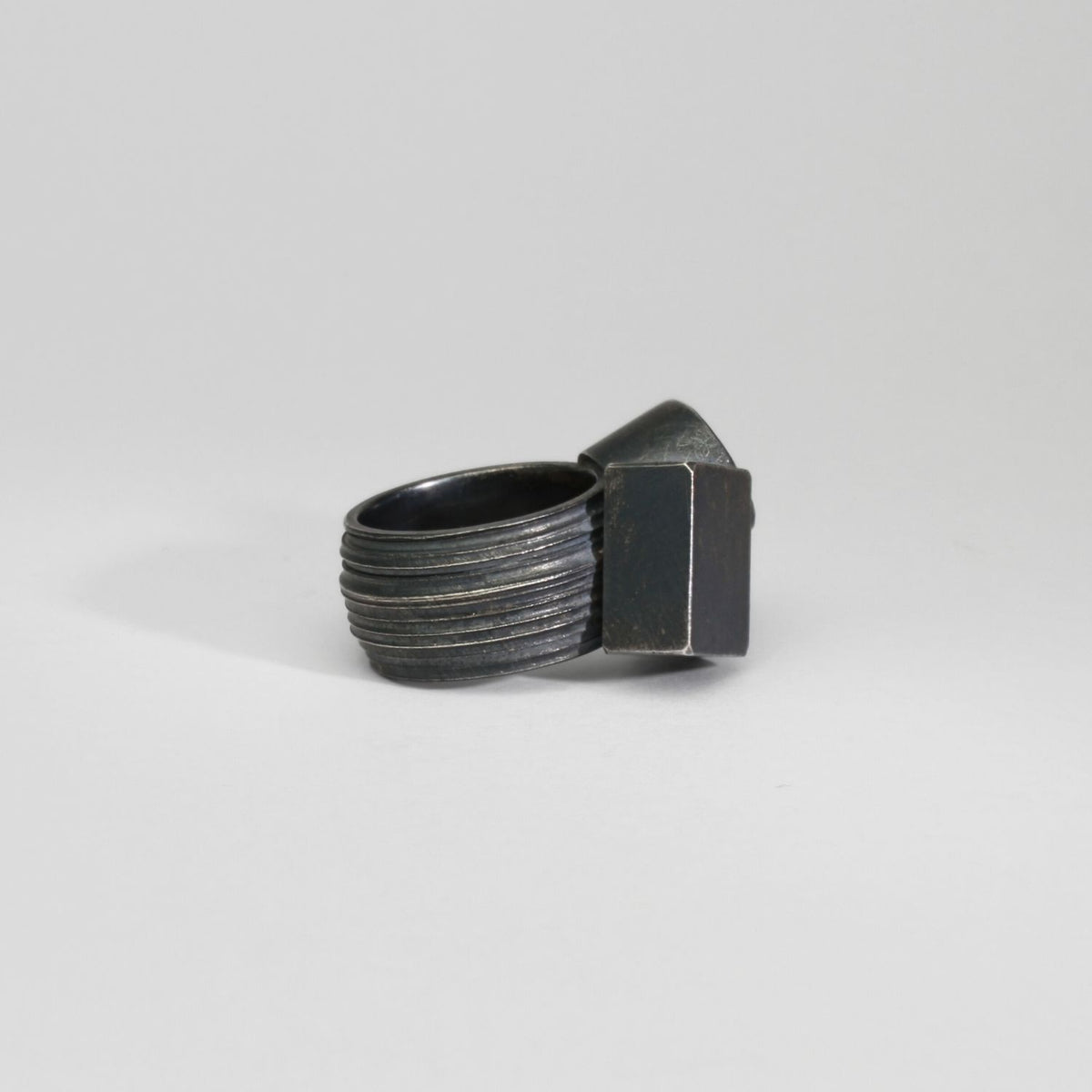 Round aquamarine black silver ring by Chris Boland