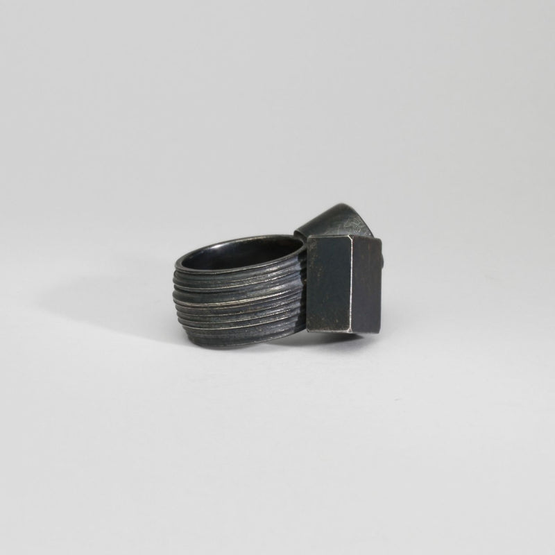 Round aquamarine black silver ring by Chris Boland