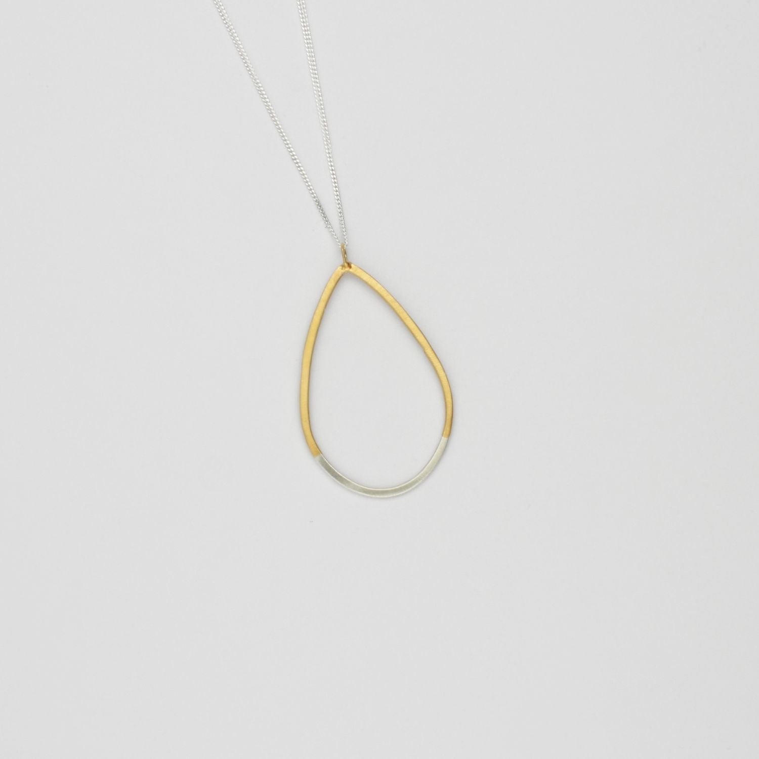 Teardrop 2 tone pendant silver with 22ct gold plating by Charlotte Reid