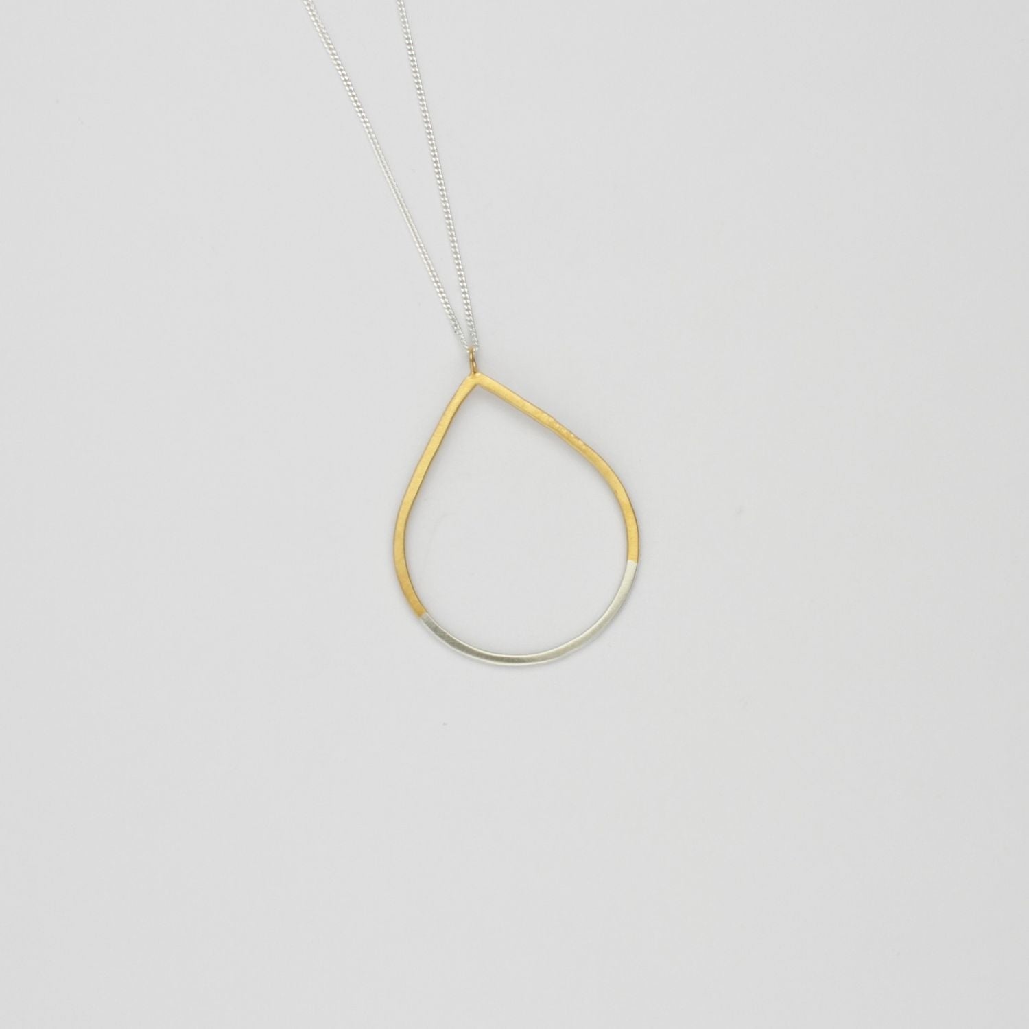 Teardrop 2 tone pendant silver with 22ct gold plating by Charlotte Reid