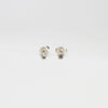 Seed studs in silver with moonstones by Charlotte Rowenna