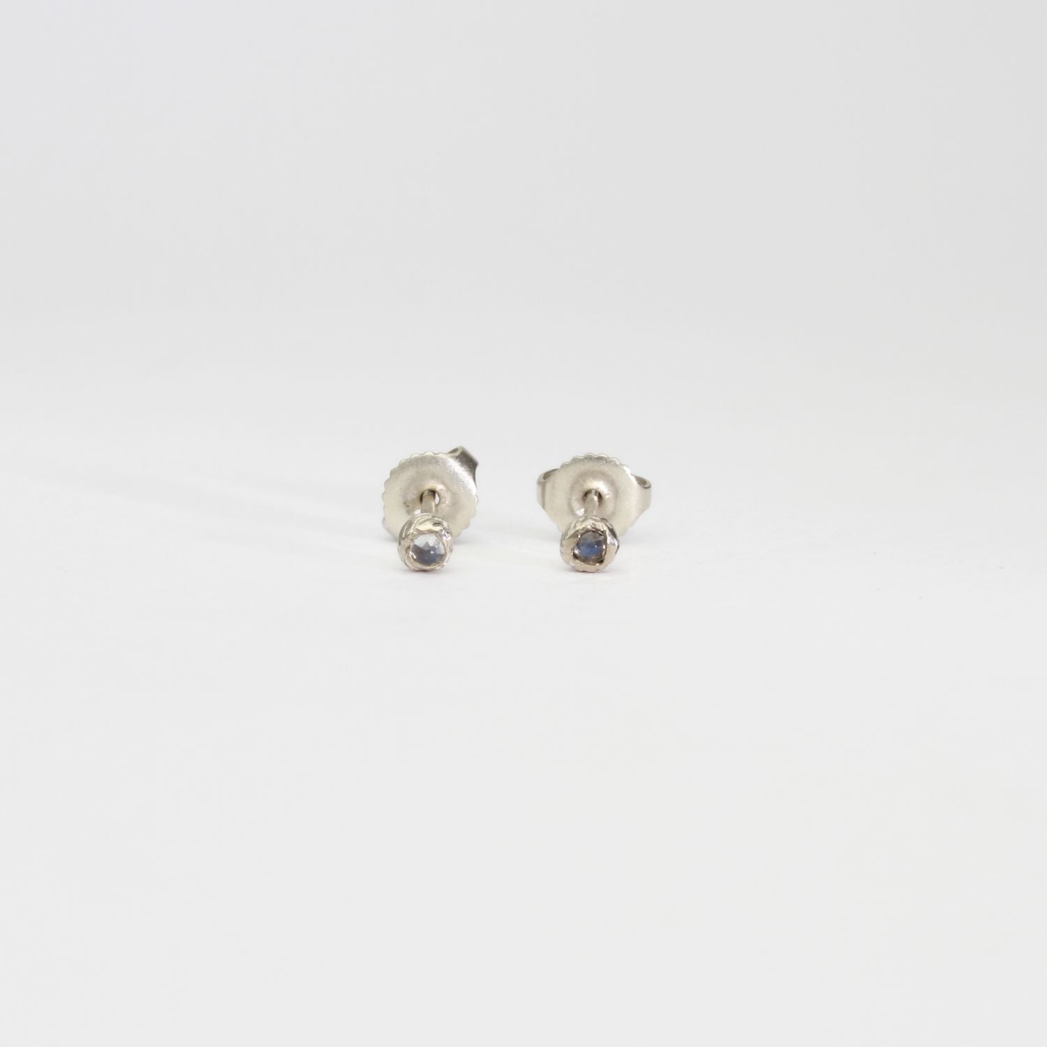 Seed studs in silver with moonstones by Charlotte Rowenna