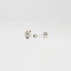 Seed studs in silver with moonstones by Charlotte Rowenna