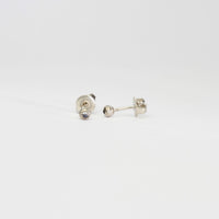 Seed studs in silver with moonstones by Charlotte Rowenna