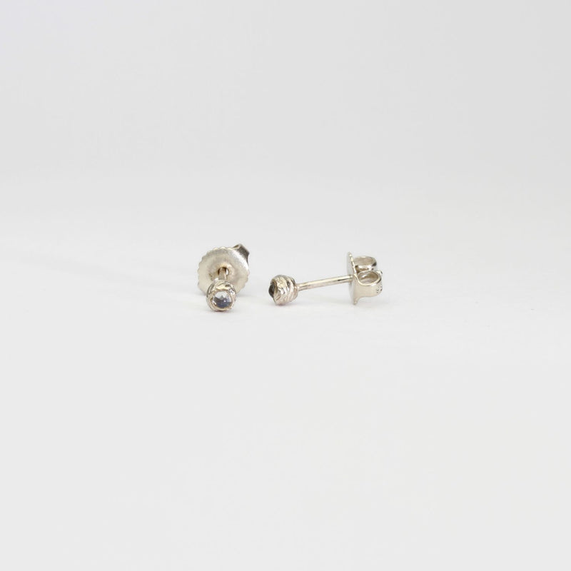 Seed studs in silver with moonstones by Charlotte Rowenna