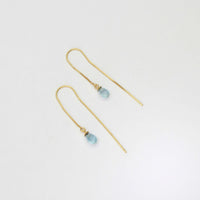 Thread through silver 22ct gold plated earrings with blue topaz by Charlotte Reid