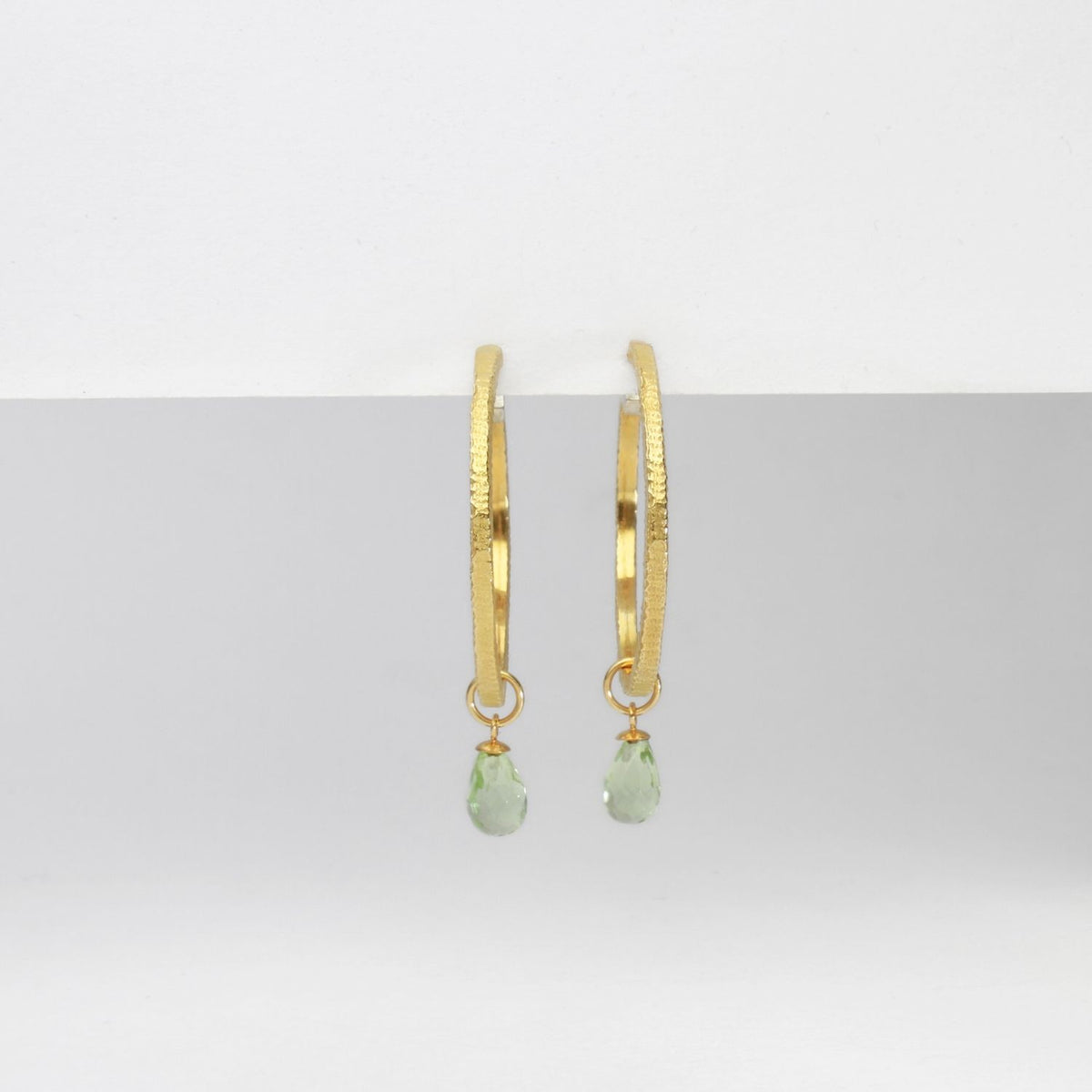 Textured hoops with green quartz silver with 22ct gold plating by Charlotte Reid