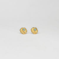 Twisted silver 22ct gold plated studs with sky blue topaz by Charlotte Reid
