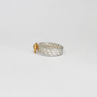 Twisted ring silver & 22ct gold plated with pink sapphire by Charlotte Reid