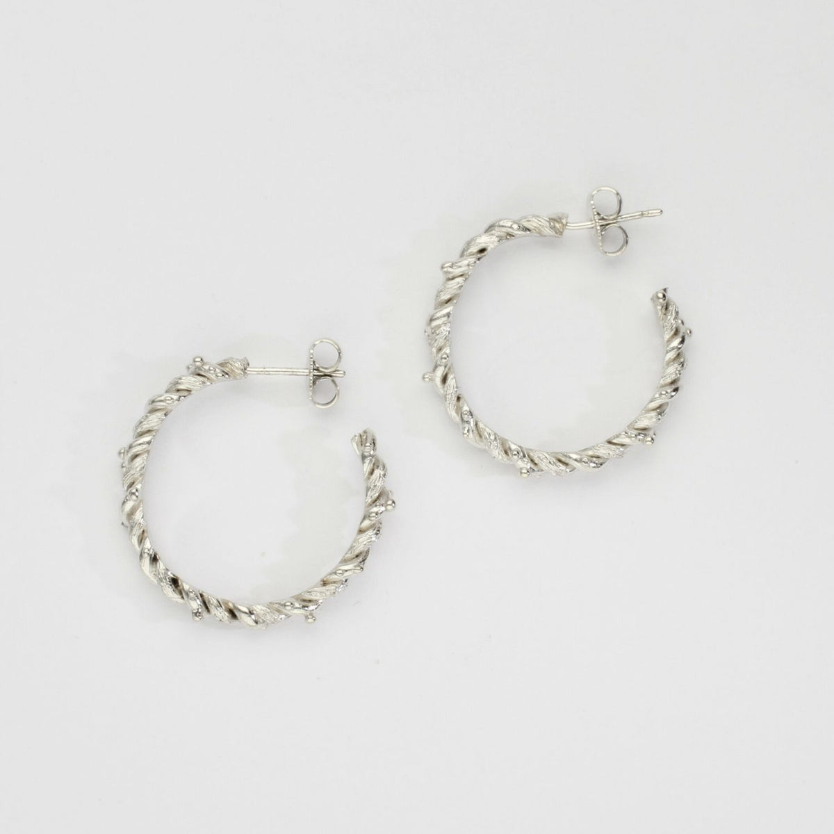 Silver fisherman's rope hoops by Charlotte Rowenna