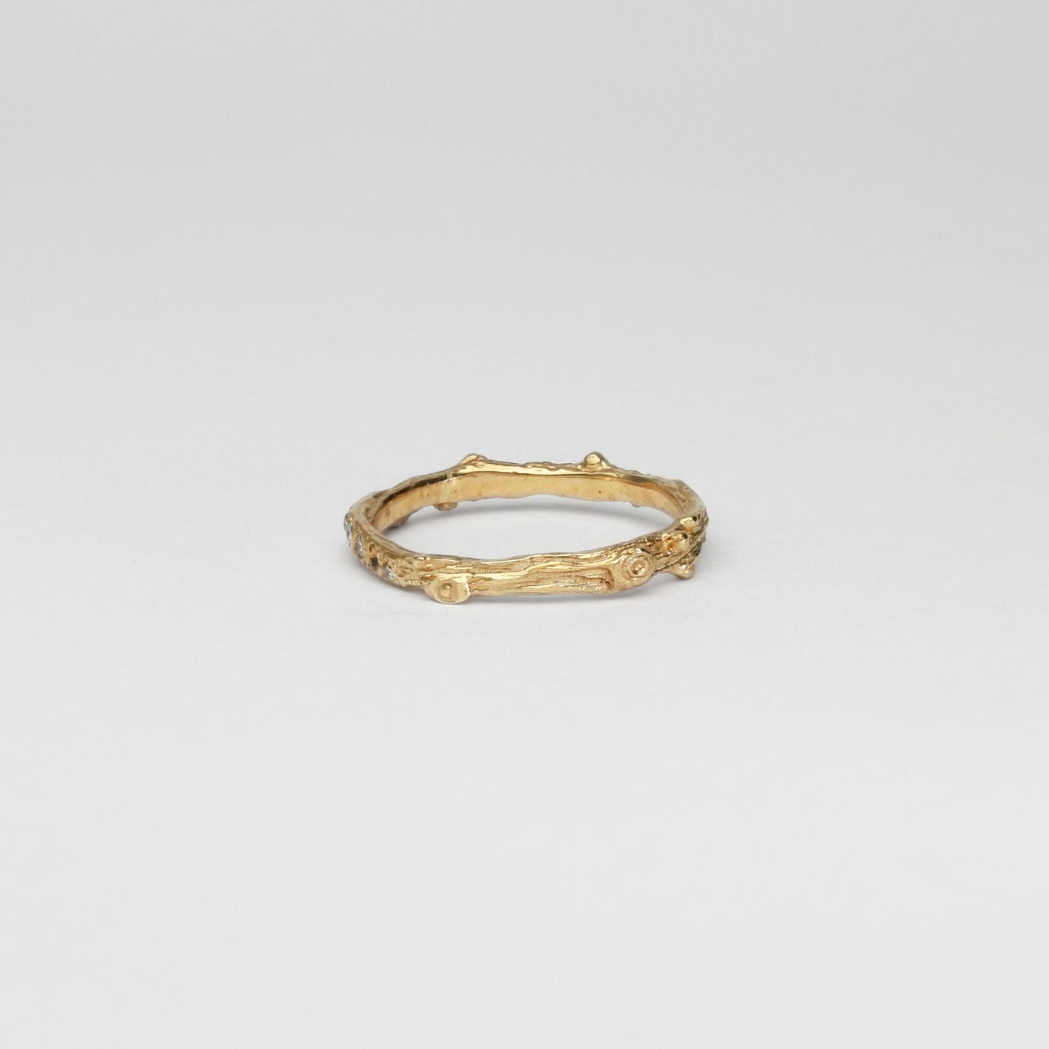 Harvest eternity 9ct gold ring with diamonds by Charlotte Rowenna