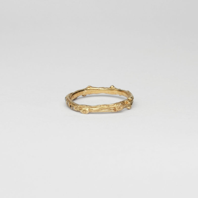 Harvest eternity 9ct gold ring with diamonds by Charlotte Rowenna