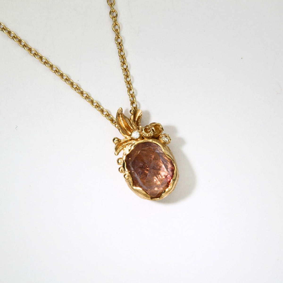 9ct gold pendant with sapphire and diamonds by Charlotte Rowenna