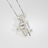 One of a Kind: ( No.18 ) Bespoke Carreg necklace / brooch in silver with baguette cut diamond