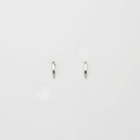 Small silver arc studs by Polished Grey