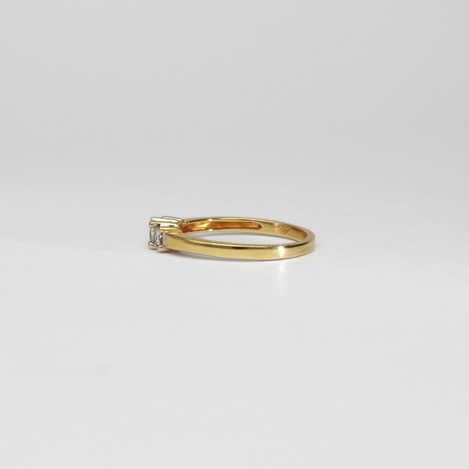 18ct gold ring with princes cut diamonds by Duncan Eves