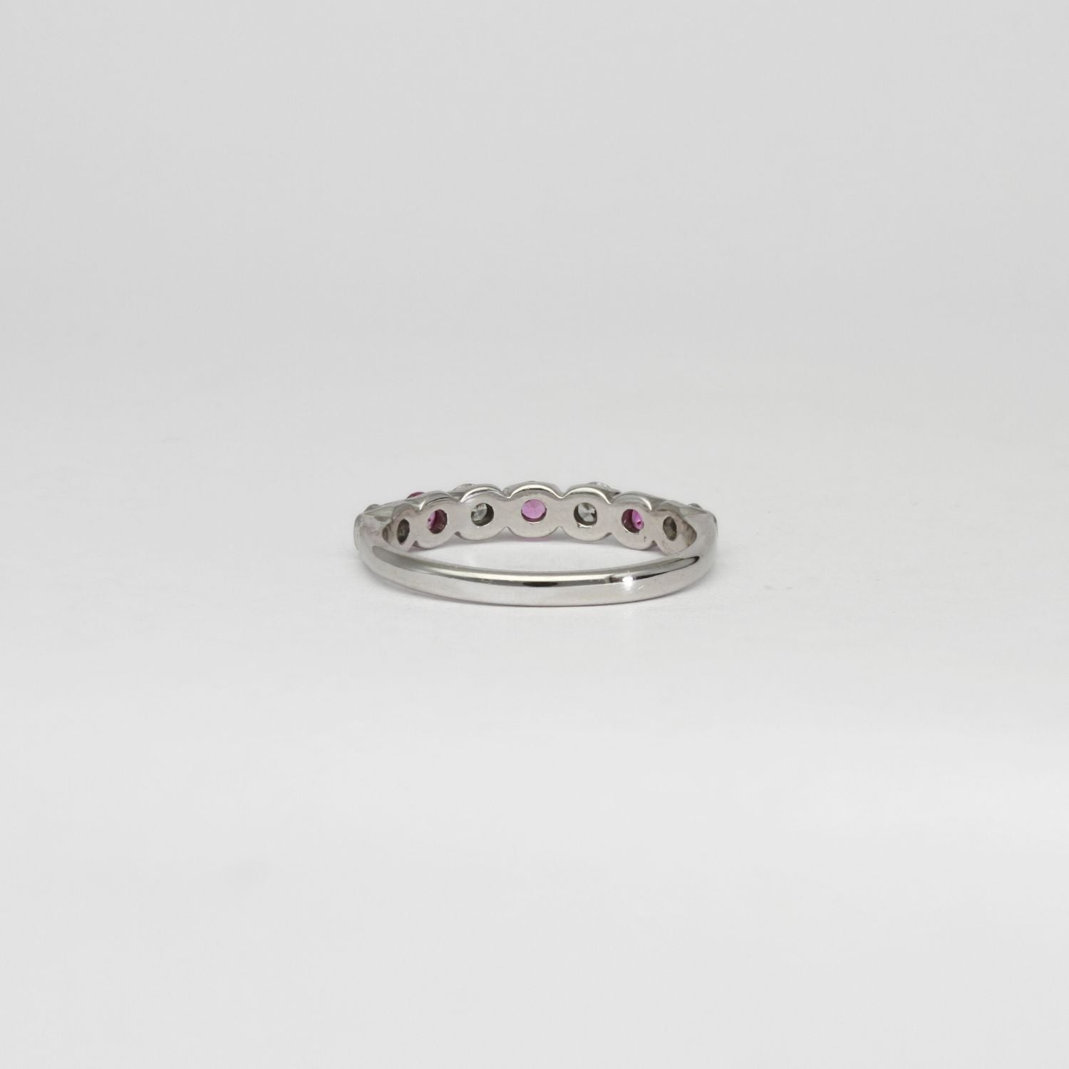 18ct white gold ring with pink sapphires and diamonds by Duncan Eves