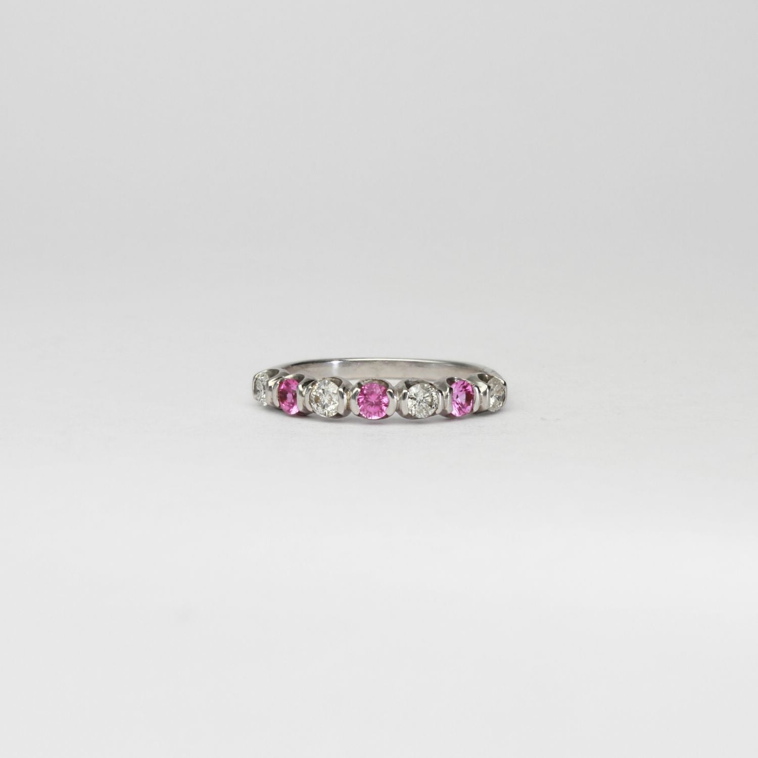 18ct white gold ring with pink sapphires and diamonds by Duncan Eves