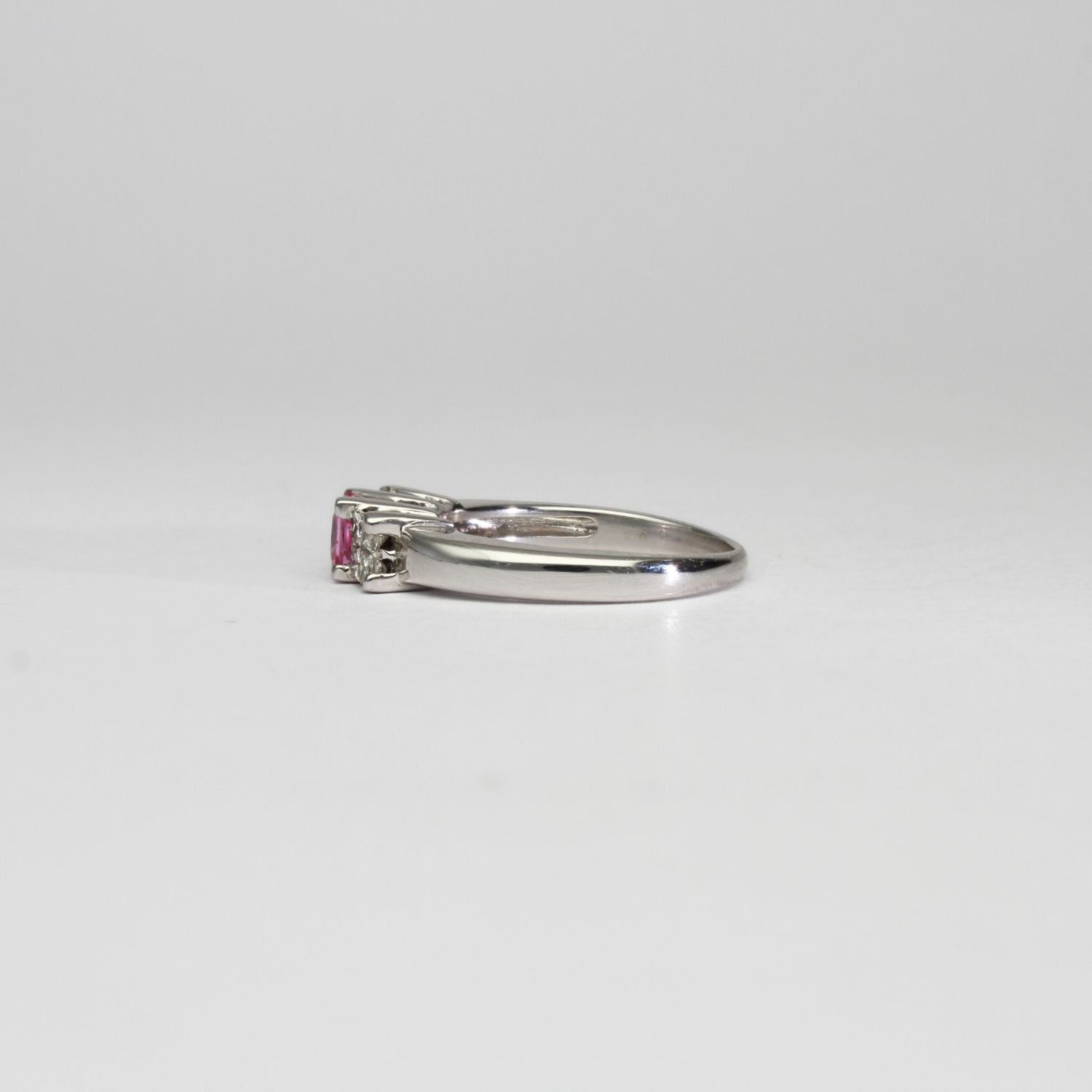 18ct white gold ring with pink sapphire and diamonds by Duncan Eves