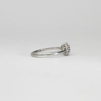 18ct white gold ring with tanzanite and diamonds by Duncan Eves