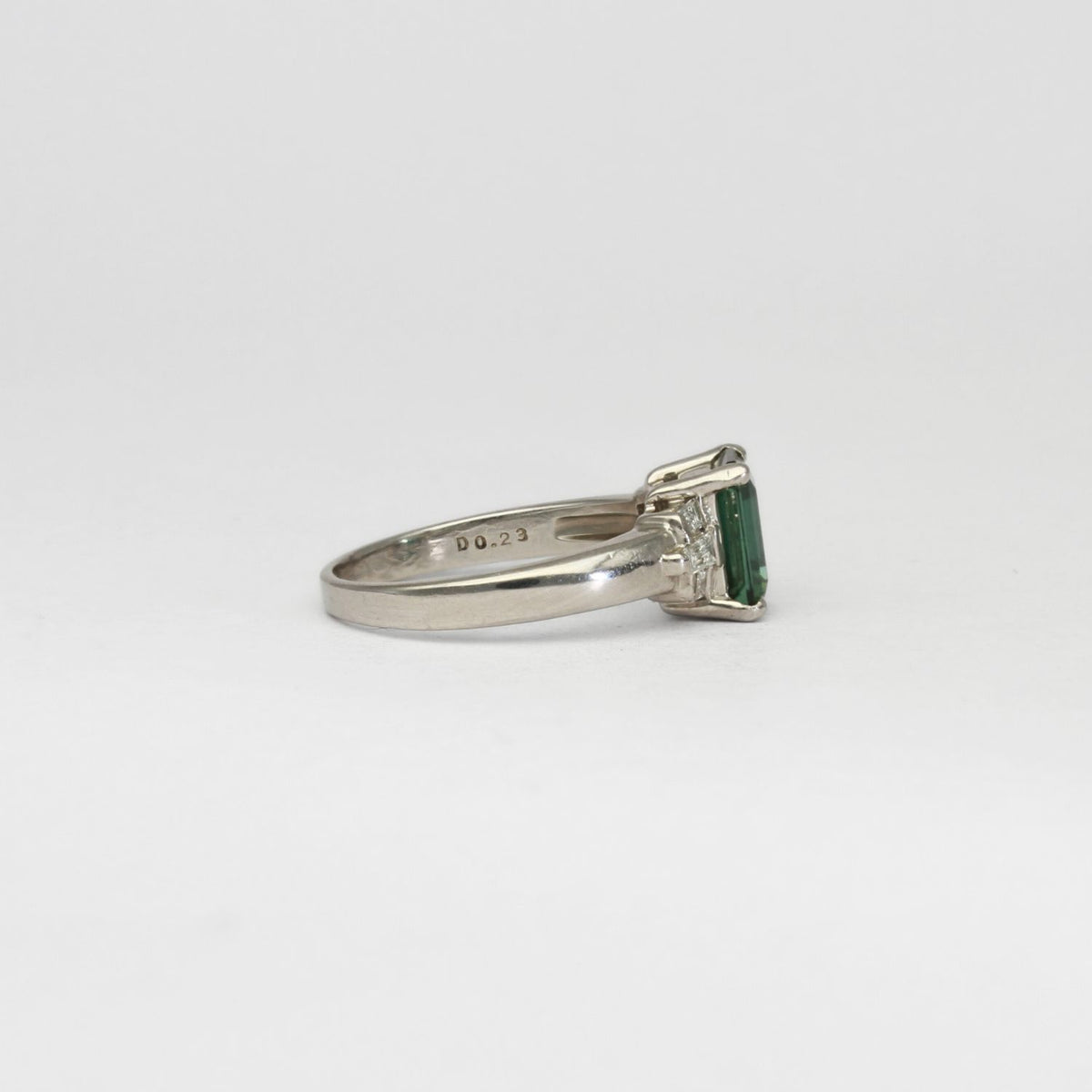Platinum ring with green tourmaline and diamonds by D E Jewellery